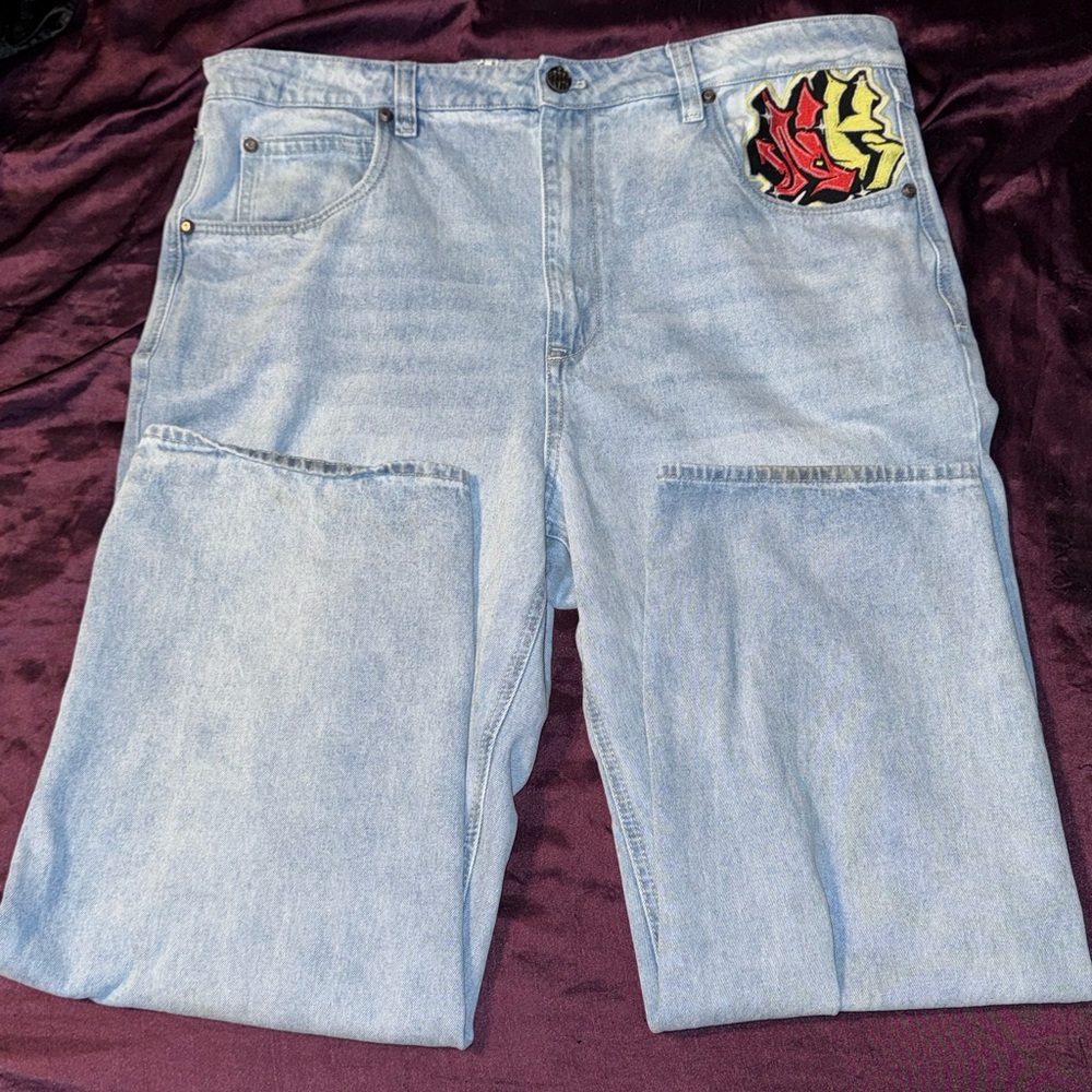 Zumiez Light Blue Jeans with Bold Patch
